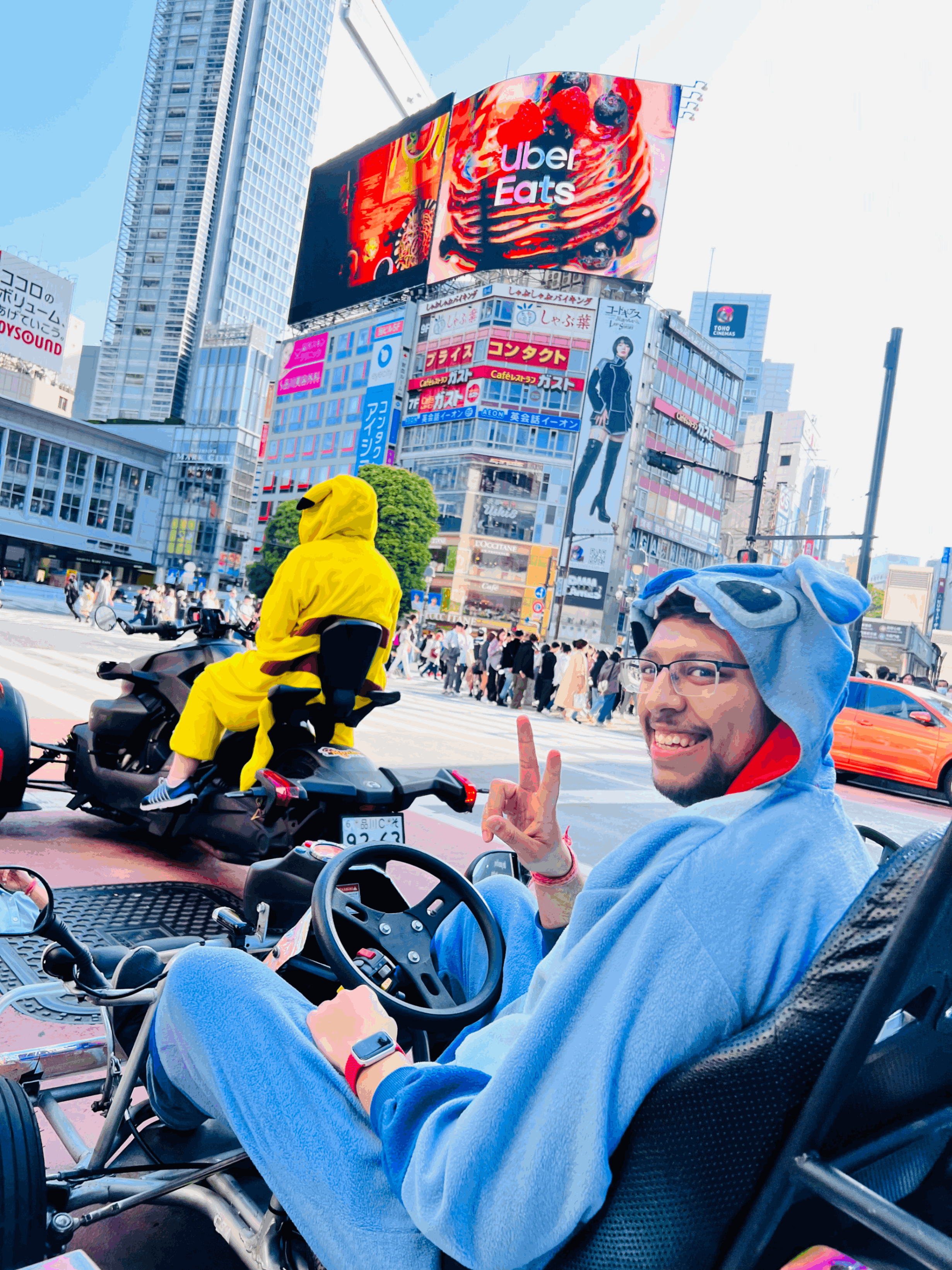 Me, sitting in a go-kart at an intersection of the Shibuya scramble crossing